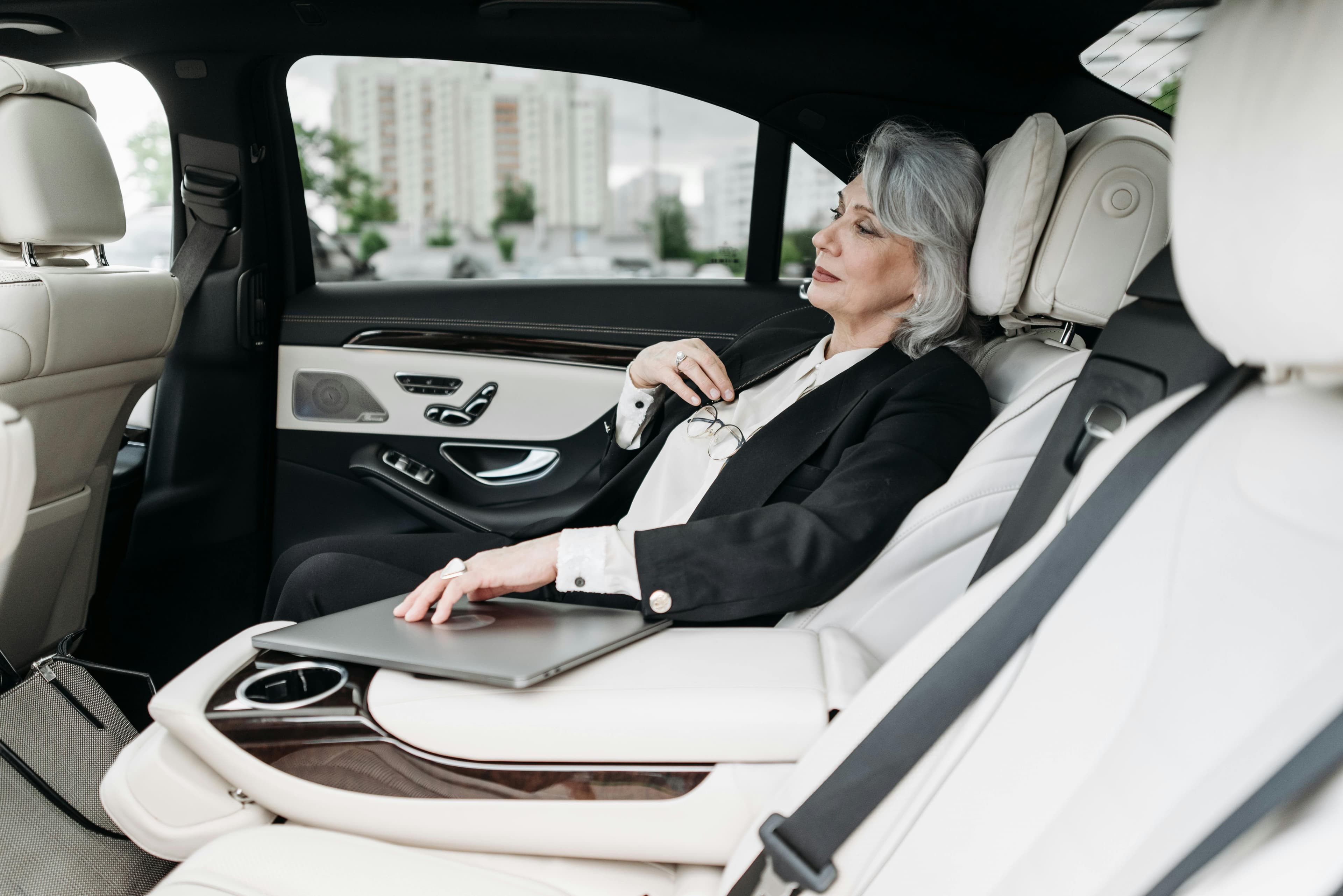 Book a professional airport chauffeur service in Manchester with Road Luxe Executive Cars for comfortable on time transfers airport chauffeur service in Manchester